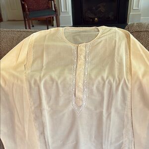 Cream/Pale yellow hand Embroidered Kurta. It is unisex kurta. White embroidery.